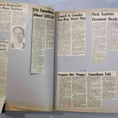 Pages 56-57 newspaper clipping unfolded