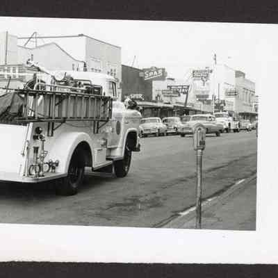 Photograph, Fireman and Firetruck, Undated