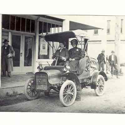 Couple in Cadillac in front of Springfield Hotel on Main Street, 1908