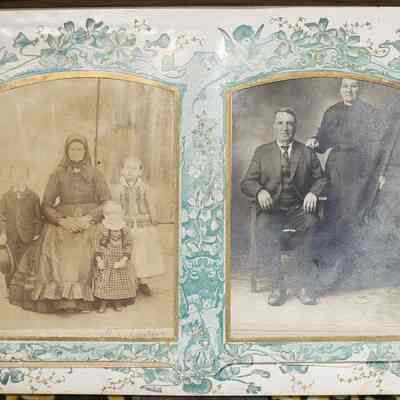 2014-002-280_img-003: Page 2 of photograph album 2014-002-280: Left: 6.5 x 4.25, Photograph of a grandmother with three children. Inscriptions: ‘Cabinet Photograph’, ‘Grandmother Rika or Riha’. 
Right: 6.5 x 4.25, Photograph of a man and woman.