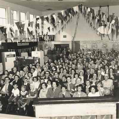 Photograph of large crowd, seated, at Springfield Electric Appliance Show, Springfield, Oregon, 1954