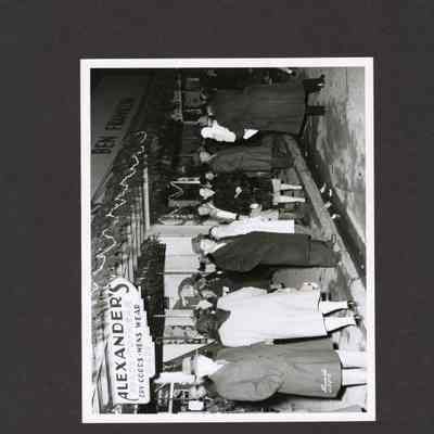 Photograph of People in Front of Alexander's Dry Goods, Christmas Time, Undated
