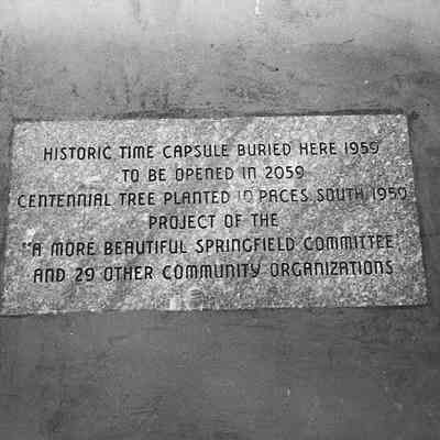 Photograph of granite plaque on site of Centennial celebration time capsule, 1959.