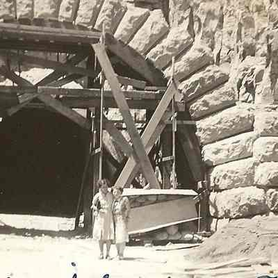 Photograph of people posing at the construction of the Highway 58 tunnel, July 2nd 1957