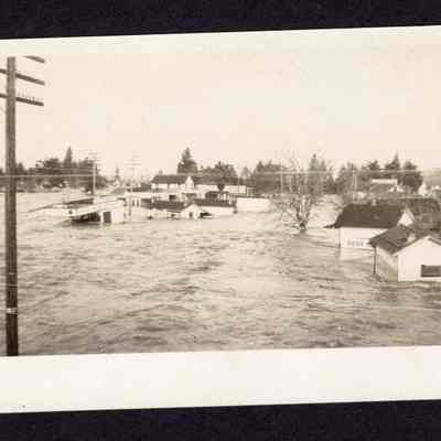 Photograph of Post Card of Flood of Business and Homes. Date unknown.