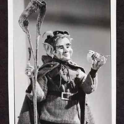 Photograph of a Elf Doll holding a bird from doll exhibit, 1995