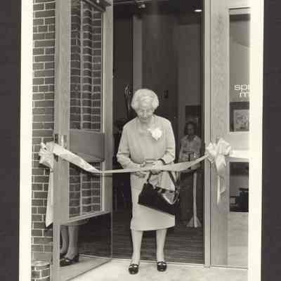 Photograph of Crystal B. Fogle cutting ribbon, Springfield, Oregon, 1981