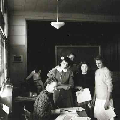 Photograph of students receiving registration papers at Springfield High School, circa 1940s