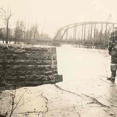 Photograph of the flooding river, taken at the Willamette River, Springfield, Oregon, 1942