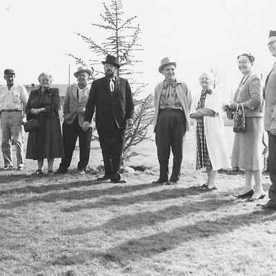 Photograph of people standing in front of Centennial Tree, 1959
