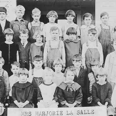Photograph of elementary students with teacher Marjorie LaSalle, Springfield, Oregon, date unknown.