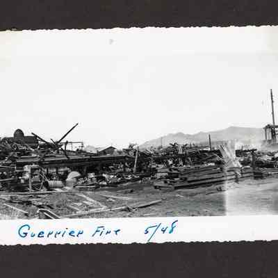 Photograph of scraps of machinery after Guerrier Fire