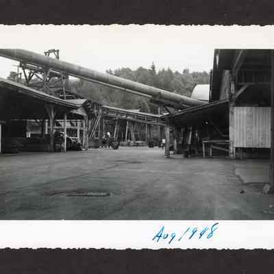Photograph of paving and mill building at Booth-Kelly Lumber Mill