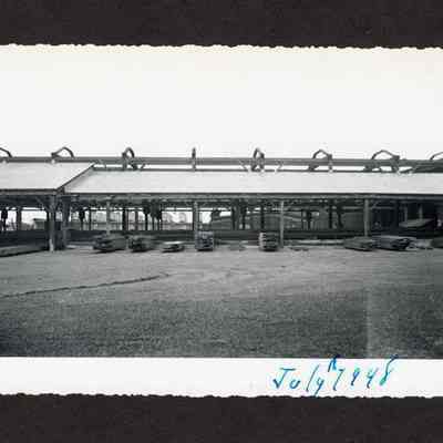 Photograph of stacks of cut lumber on pavement at Booth-Kelly Lumber Mill, Springfield, Oregon, 1948
