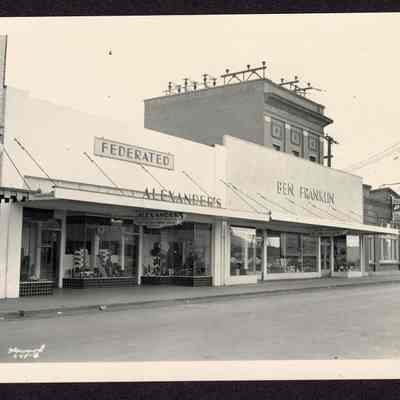 Photograph of Main St. Springfield, Oregon, Alexanders, Ben Franklin, Mountain Power buildings, Date unknown.