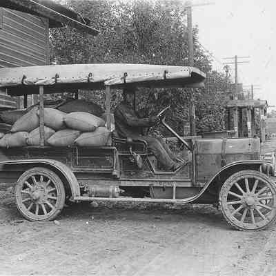 Photograph of a truck with Grain Sacks