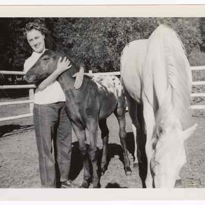 Photograph of Etta Davis with horses, Hidden Valley Ranch, Oregon, undated