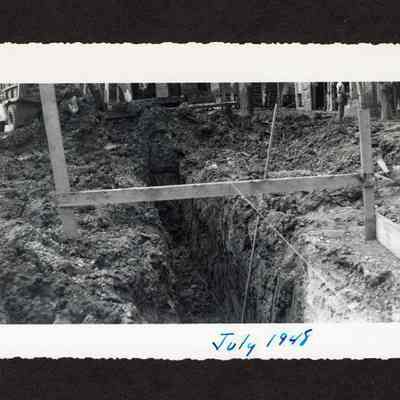 Photograph of dug path at Booth-Kelly Lumber Mill drainage construction site, Springfield, Oregon, 1948