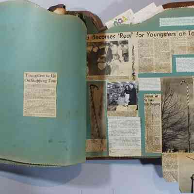 Pages 58 and 59 newspaper clipping unfolded