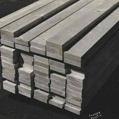 Photograph of Thick Lumber Stack, Date Unknown