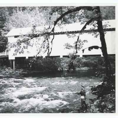 Photograph of a fisherman at Horse Creek Bridge, McKenzie River, Oregon, circa 1969
