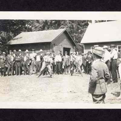 Photograph on postcard of a game of ball, from the lodge picnic at the Camp Creek School