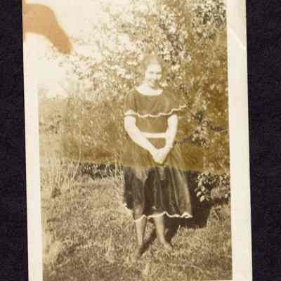 Photograph of unknown women, outside in an unknown location