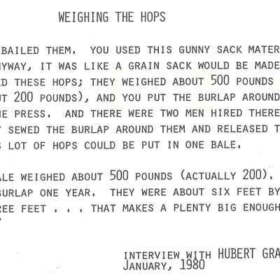 Photograph of 2 men Weighing Hops at Seavey Hop Yard.