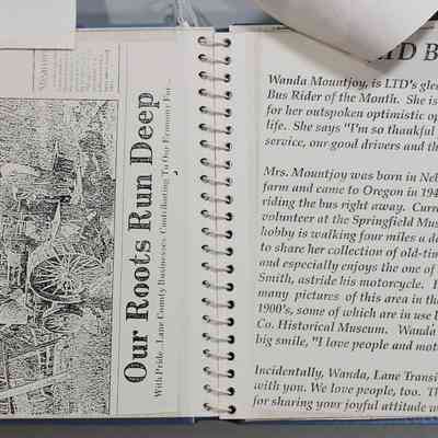 Pages 14 and 15 newspaper clippings underneath tapped articles