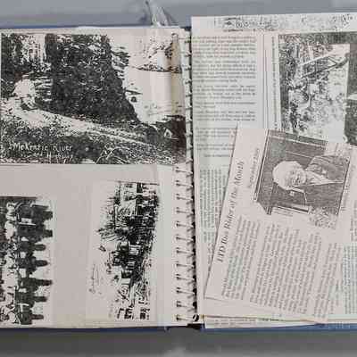 Pages 18 and inside back cover with loose articles on it