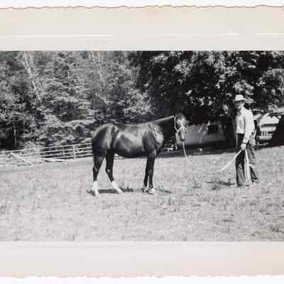 Photograph of Bill Davis senior and horse Annie, Hidden Valley Ranch, Oregon, undated