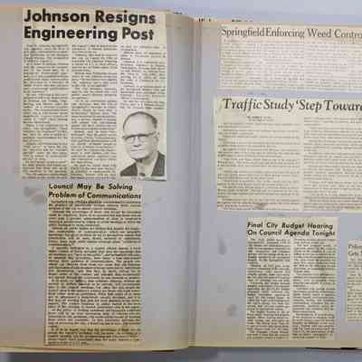 Pages 14-15 newspaper clipping unfolded
