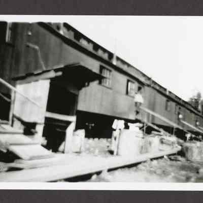 Photograph of bunkhouse made of railroad cars