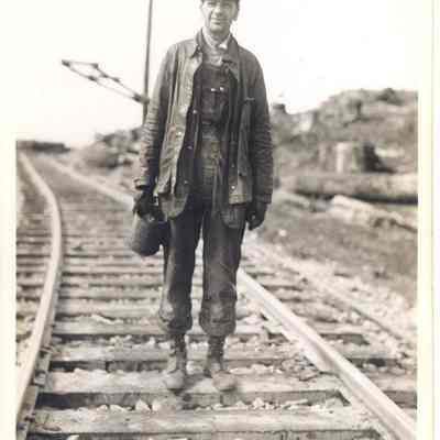 Photograph of Cliff Abrams on Booth-Kelly railroad tracks, above Wendling, Oregon
