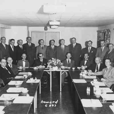 Photograph of businessmen lunch, date unknown