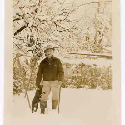 Photograph of 'Dad' Vallier and dog Patey, undated