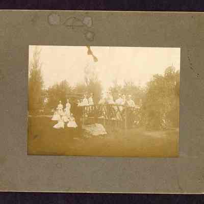 Photograph of 15 Nurses near a railing, Unknown date and location
