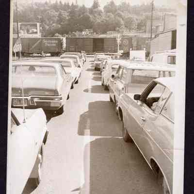 Photograph, Traffic as Train Passes, South at 5th St., Springfield, Oregon, Undated