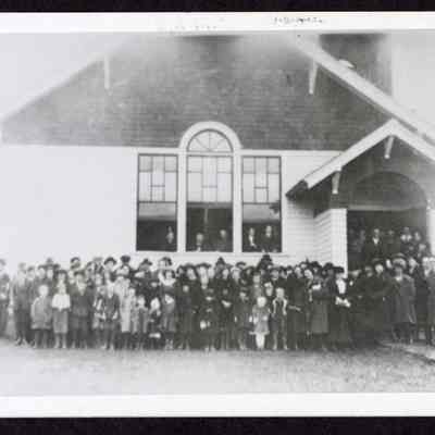 Photograph of a large group of people in front of Walterville Presbyterian Church