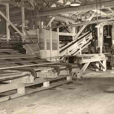 Photograph of the inside of an unknown Lumber Mill, undated
