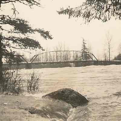 Photograph of the flooding river, taken at the Jasper Bridge, Oregon, 1943