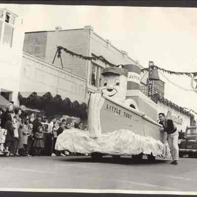 Photograph of Christmas Parade float, a tug boat named Little Toot. From Jaycee. Date unknown.