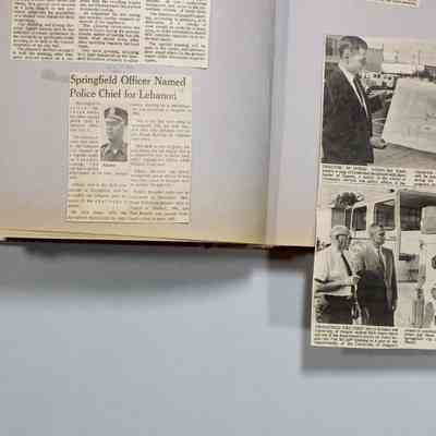 Pages 12-13 newspaper clipping unfolded
