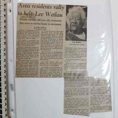 Loose newspaper clipping in binder insert