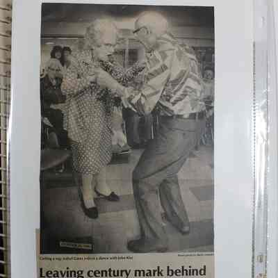 Loose newspaper clipping in binder insert