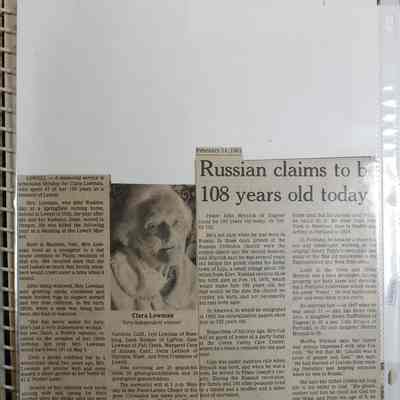 Loose newspaper clipping in binder insert