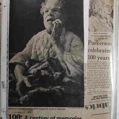 Loose newspaper clipping in binder insert