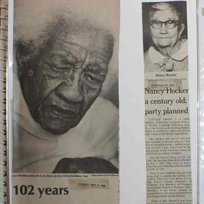 Loose newspaper clipping in binder insert