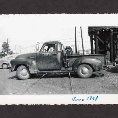 Photograph of the Booth-Kelly Lumber Co. Truck with hose