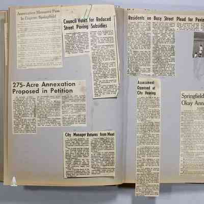 Pages 8-9 newspaper clipping unfolded